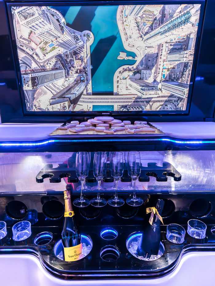 Champagne service in the Sprinter before a concert or game day