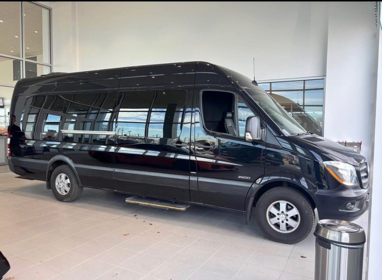 Glossy black Mercedes Sprinter 2500 in a bright showroom